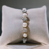 Pulsera años cuarenta de oro y oro blanco con diamantes y perlas
